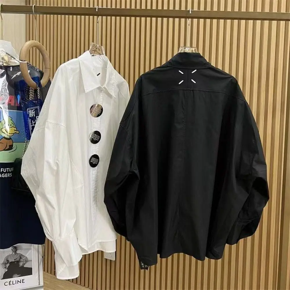 女性用砂ポロシャツ、刺buttonボタン、バットウィングスリ - Embroidery Blouse のレビューと価格